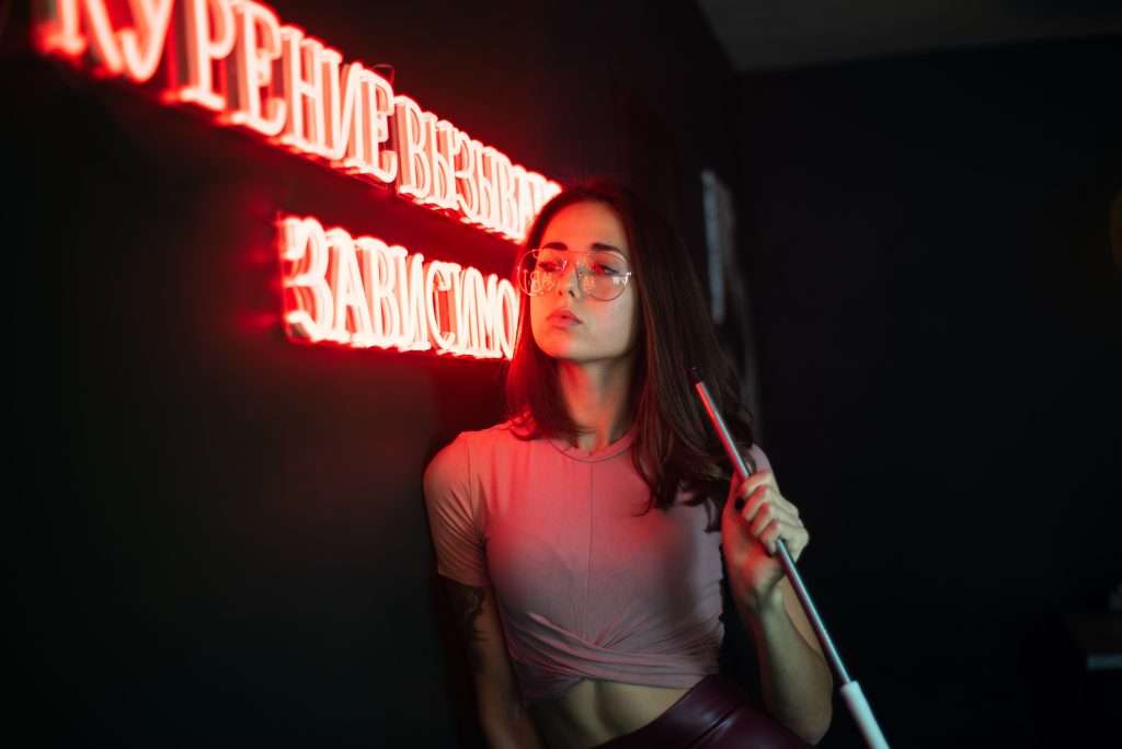 Brisbane and Gold Coast strippers reading FAQs about starting escort work, safety, and combining strip club dancing with escorting opportunities